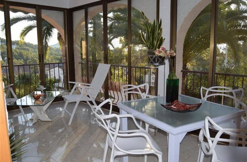 Location de vacances - Villa à Gandia - terrasse cristal pour dining et relaxation