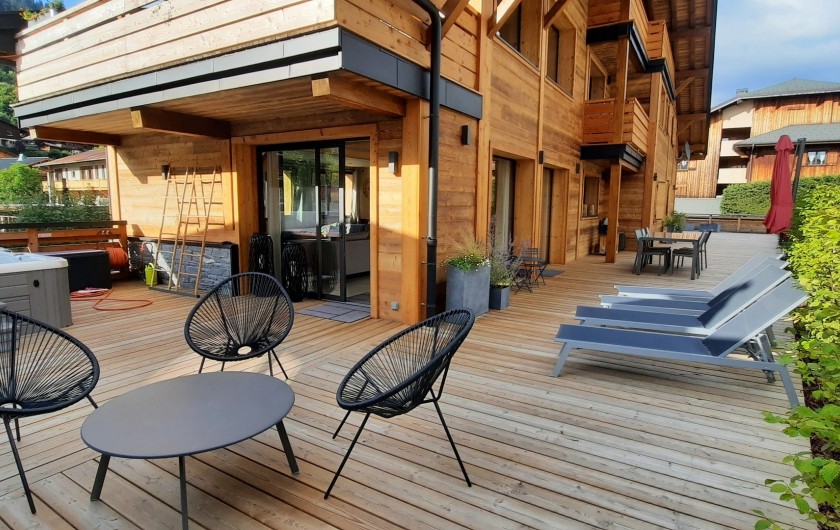 Location de vacances - Appartement à Les Gets - Terrasse espace détente