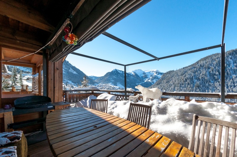 Location de vacances - Chalet à Châtel - terrasse l'hiver