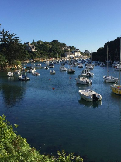 Location de vacances - Appartement à Clohars-Carnoët - le port le soir marée haute, le coucher de soleil sur le séjour