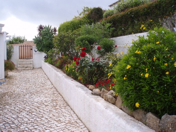 Location de vacances - Chalet à Luz - Jardin fleuri, petit portail