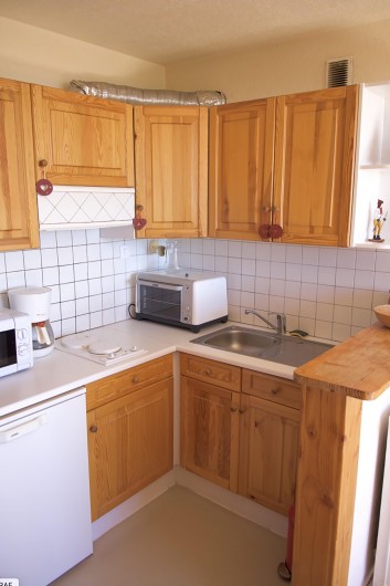 Location de vacances - Appartement à Super Besse - coin cuisine équipée