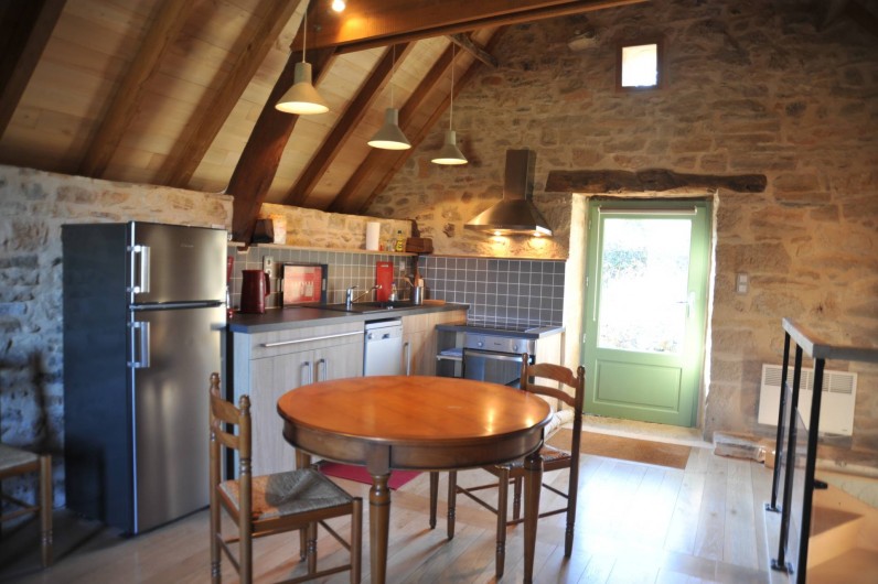 Location de vacances - Gîte à Corn - coin cuisine et coin salle a manger