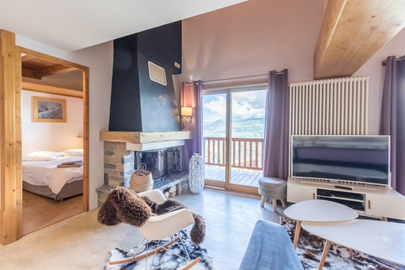 Location de vacances - Appartement à Arc 1800 - Le salon comprend une belle cheminée pour profiter de belles flambées l'hiver