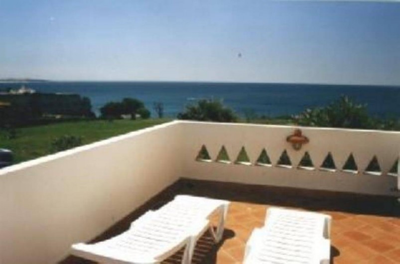 Location de vacances - Villa à Porches - Terrasse avec vue panoramique sur l'océan