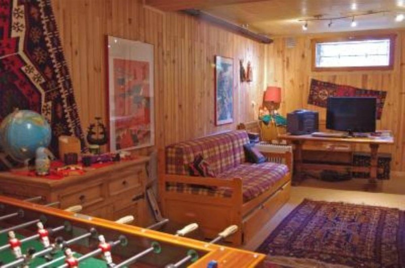 Location de vacances - Chalet à Saint-Gervais-les-Bains - Salle de jeux avec canapé-lit