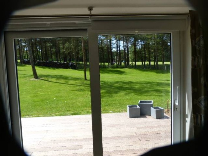 Location de vacances - Appartement à Hardelot-Plage - vue du salon sur le golf des dunes