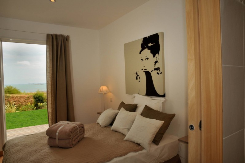 Location de vacances - Villa à Roscoff - chambre avec un grand lit