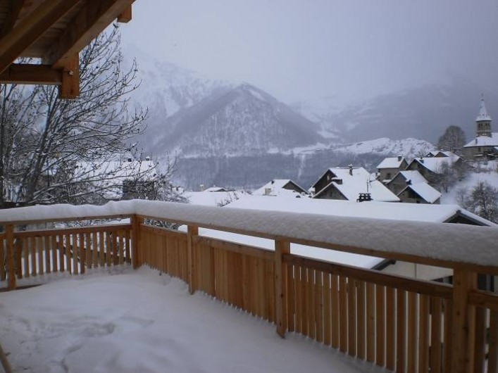 Location de vacances - Chalet à Mizoën - terrasse l'hiver