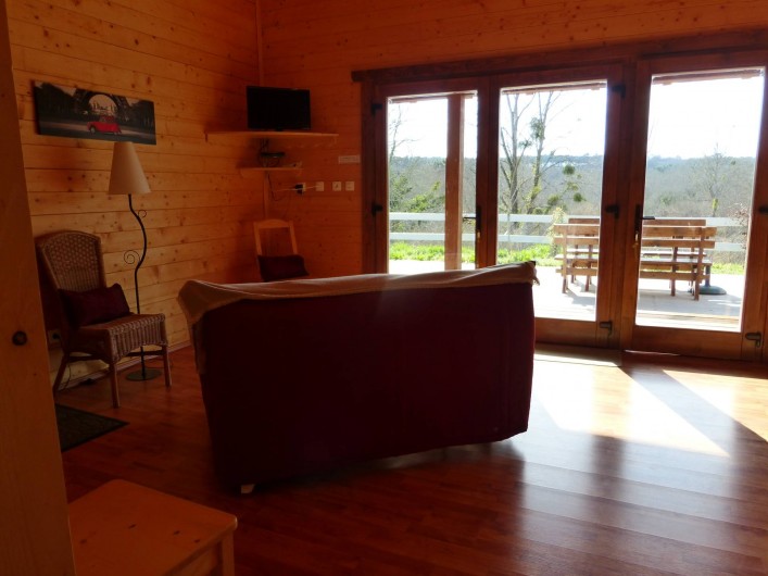 Location de vacances - Chalet à Pompiey - coin repos vue sur la forêt