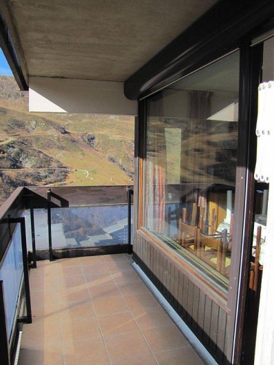 Location de vacances - Appartement à Les Menuires - balcon séjour sud l'été