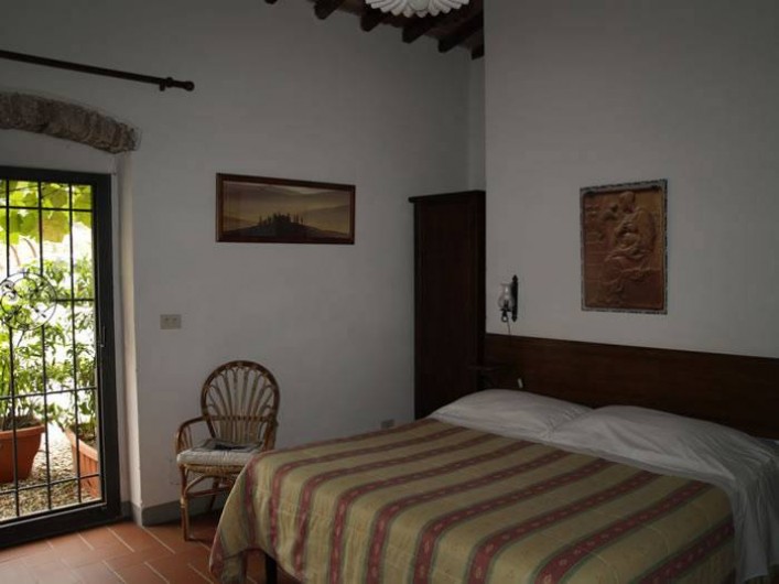 Location de vacances - Appartement à San Jacopo Al Girone - Chambre de la location "Fienile all'Ombra"