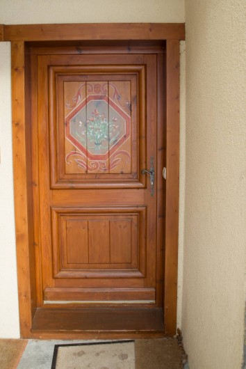 Location de vacances - Appartement à Les Carroz d'Arâches - porte entrée
