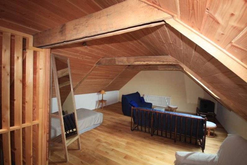 Location de vacances - Maison - Villa à Clohars-Carnoët - coin télé lecture et jeu