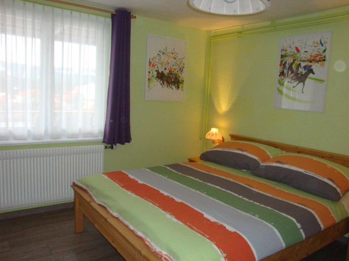 Location de vacances - Appartement à Les Breuleux - chambre à coucher