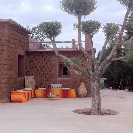 Location de vacances - Riad à Marrakech - Coin détente dans jardin