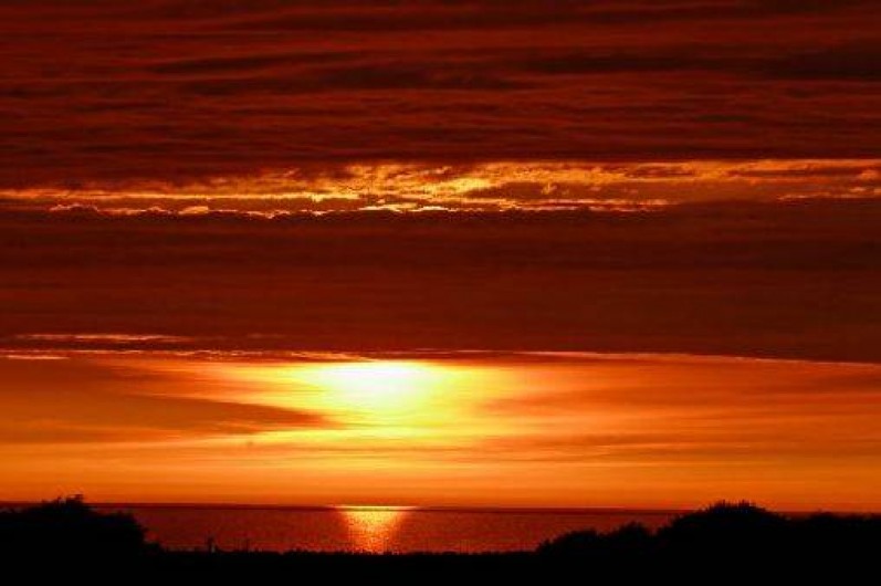 Location de vacances - Gîte à Saint-Martin-aux-Buneaux - Vue Soleil couchant
