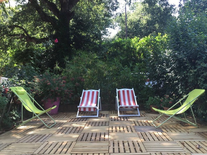 Location de vacances - Appartement à Santa-Lucia-di-Moriani - Espace détente dans Jardin Ombragé (Grand Chêne)