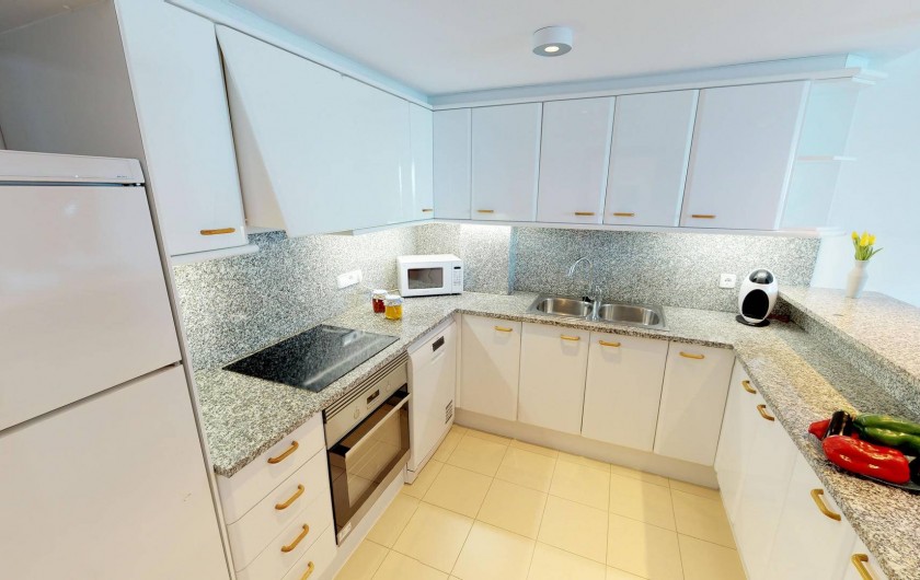 Location de vacances - Appartement à Sant Antoni de Calonge - cuisine américaine entièrement équippée