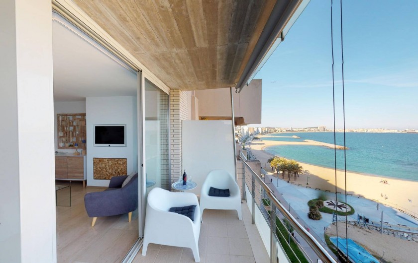 Location de vacances - Appartement à Sant Antoni de Calonge - terrasse pieds dans l'eau