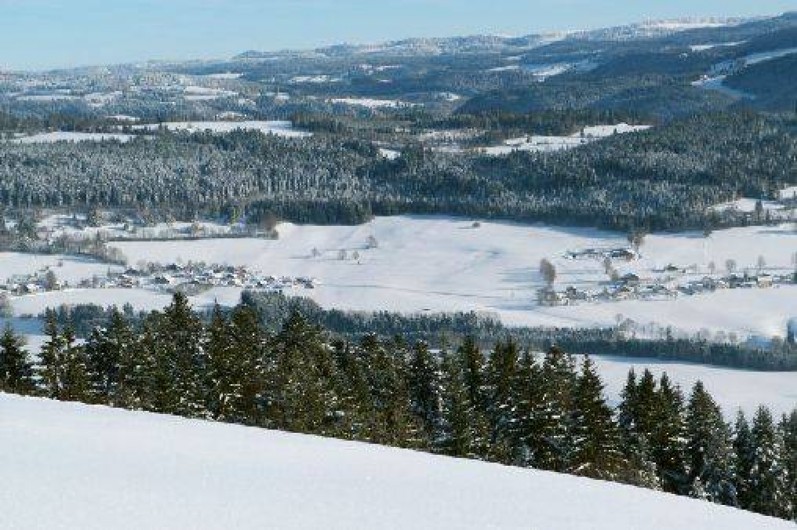 Location de vacances - Gîte à Les Fins - Vue depuis le Mont Vouillot en hiver