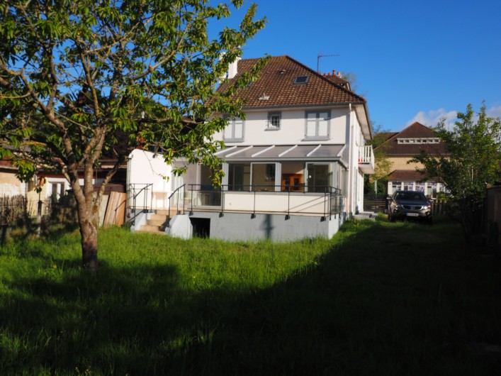 Location de vacances - Appartement à Merville-Franceville-Plage - RDC sur véranda terrasse et jardin