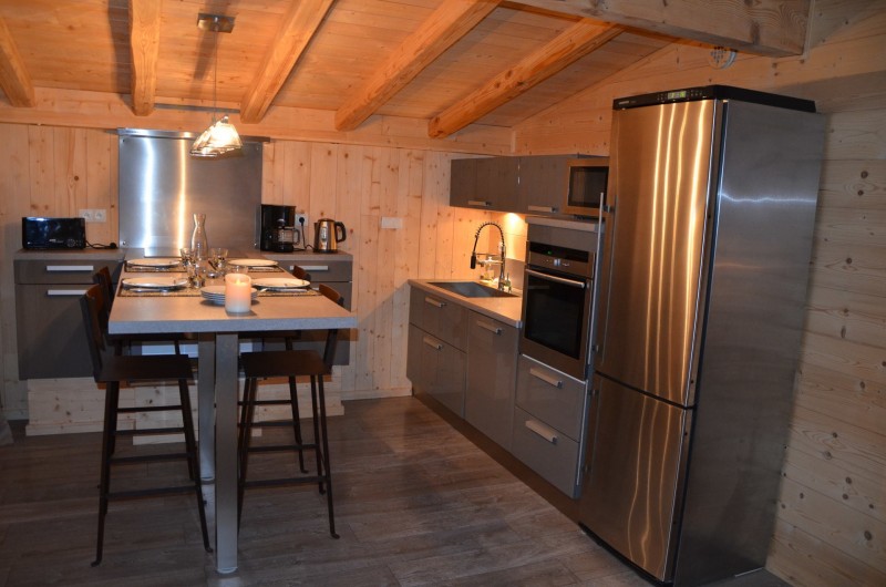 Location de vacances - Studio à L'Alpe d'Huez - salle à manger et cuisine