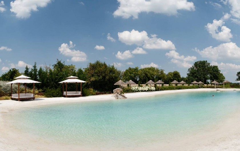 Location de vacances - Villa à Saint-Just-Luzac - La lagon de 1000 m² avec plage de sable fin et pavillons balinais