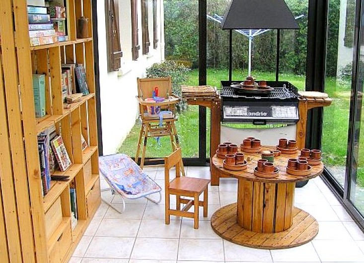Location de vacances - Villa à Cancale - Le coin ludothèque dans la véranda.