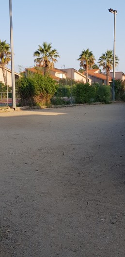 Location de vacances - Villa à Saint-Cyprien Plage - Terrain de boules de la résidence