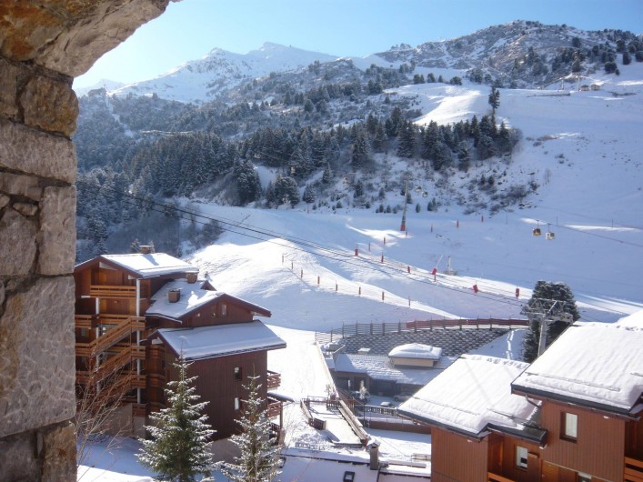 Location de vacances - Appartement à Méribel-Mottaret - Vue depuis le séjour et le balcon