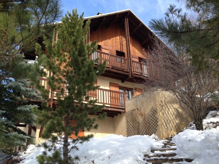 Location de vacances - Chalet à Briançon - chalet sous la neige