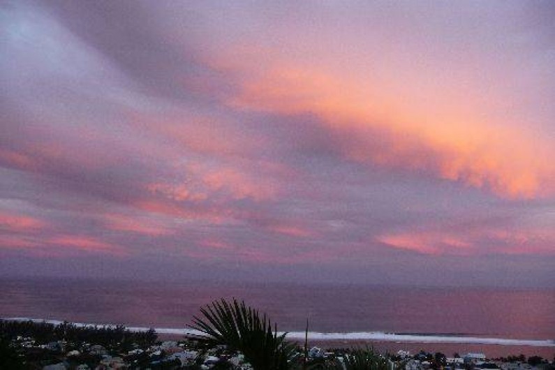 Location de vacances - Chalet à Saint-Leu - coucher de soleil vue de la veranda