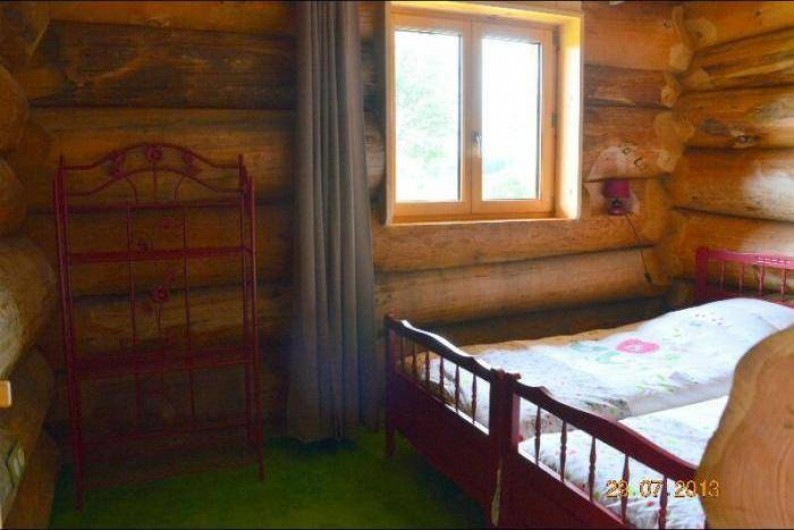 Location de vacances - Chambre d'hôtes à Saint-Anthème - Chalet en rondins de bois