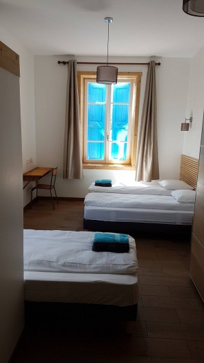 Location de vacances - Maison - Villa à Le Bourg-d'Oisans - Chambre pour 3 personnes avec ensuite