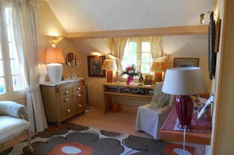 Location de vacances - Chambre d'hôtes à Les Andelys - Vue de la chambre sur la jardin et la Seine