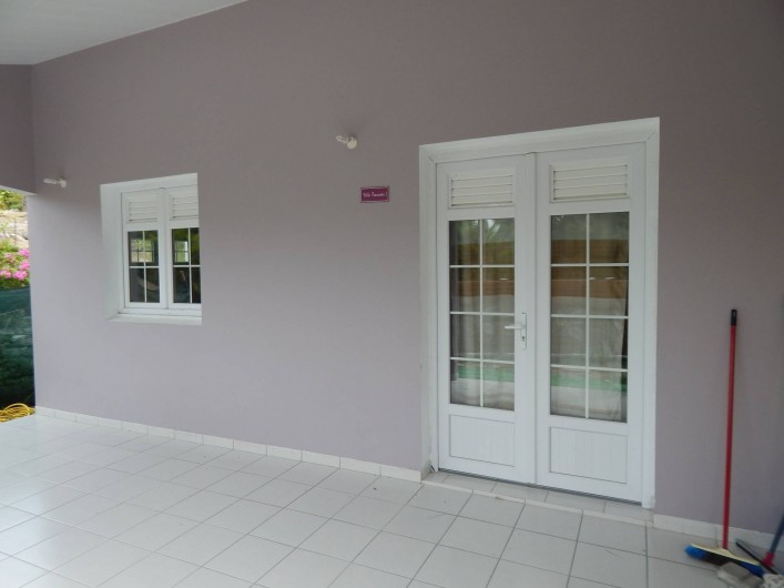 Location de vacances - Villa à Sainte-Anne - véranda appartement 2