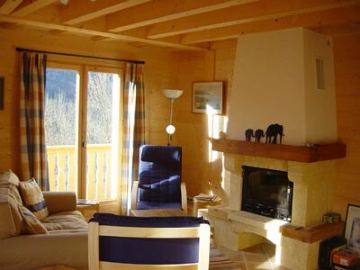 Location de vacances - Chalet à Verchaix - Sitting Room with wood burner fire