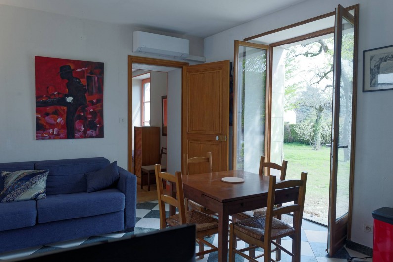 Location de vacances - Appartement à Saint-Dyé-sur-Loire - Salon avec accès jardin