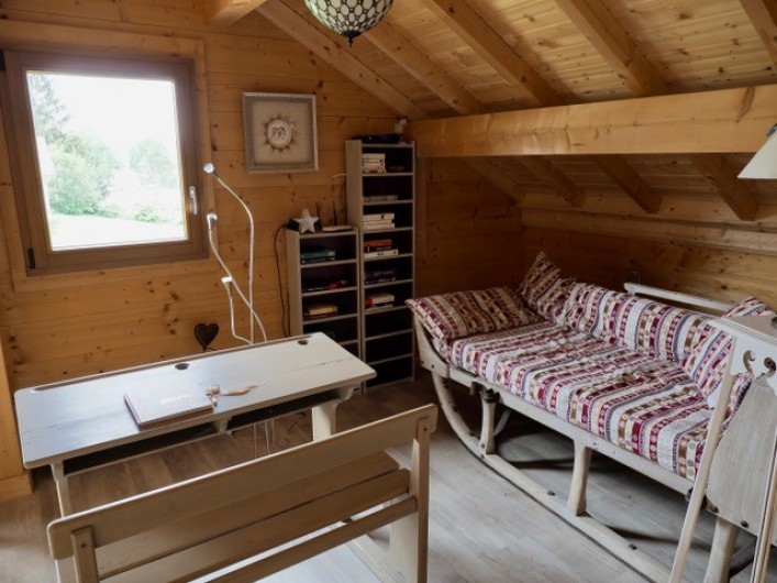 Location de vacances - Chalet à La Pesse - mezzanine avec canapé une place