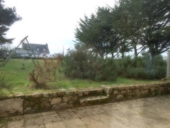 Location de vacances - Gîte à Erdeven - vue sur espace jardin en hiver