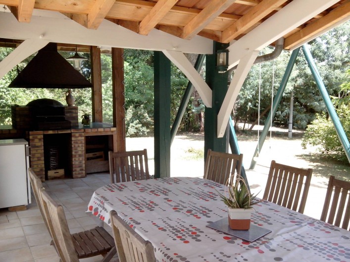 Location de vacances - Villa à Seignosse - coin repas extérieur , barbecue