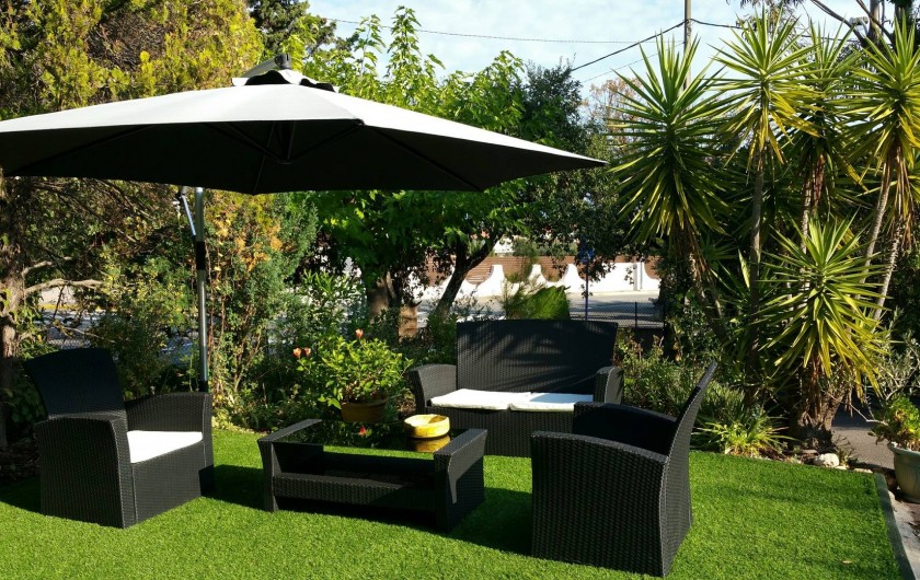 Location de vacances - Appartement à Saint-Aygulf - Coin repos devant la salle à manger