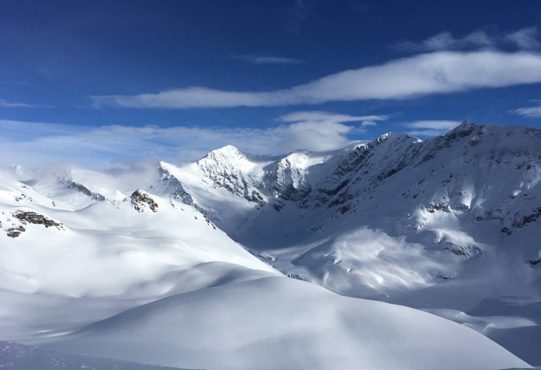 Location de vacances - Appartement à Sainte-Foy-Tarentaise - Vue sur la montagne en hiver
