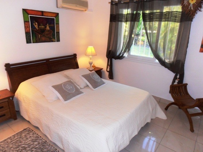 Location de vacances - Villa à Saint-François - Chambre 1 climatisée avec grand lit
