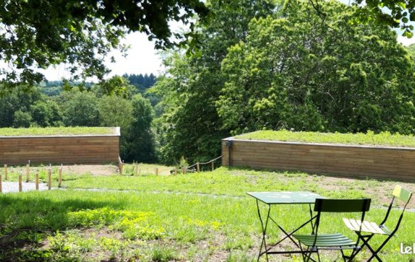 Location de vacances - Chalet à Saint-Sylvestre - Vue sur toitures végétalisés depuis l'espace détente.