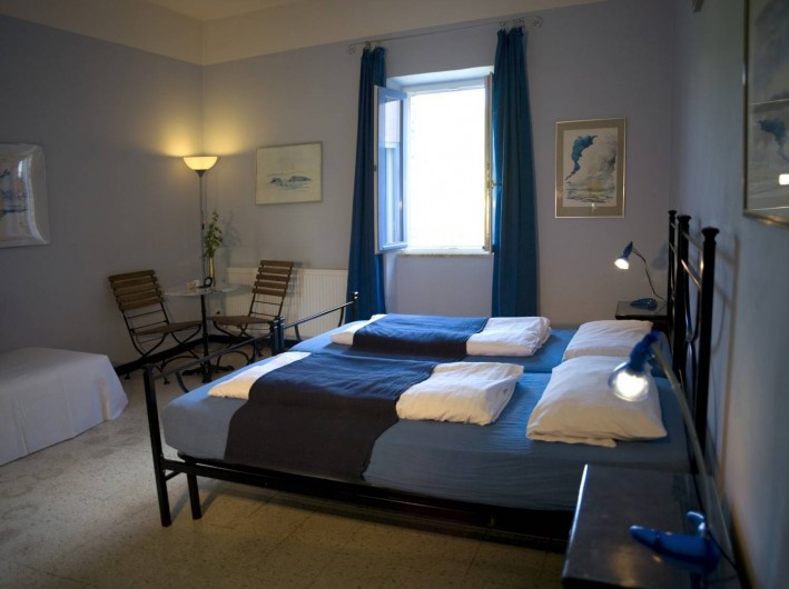 Location de vacances - Appartement à Castel Rigone - Chambre lit "Camera blu" dans appt. "Il Peperino" La Rogaia