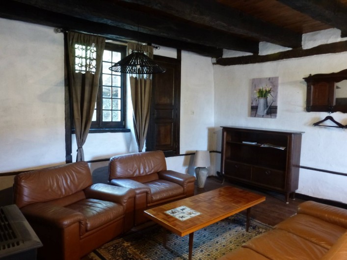 Location de vacances - Gîte à Saint-Hilaire-Peyroux - Le plaisir au salon et si besoin la douce chaleur d'un poêle à bois