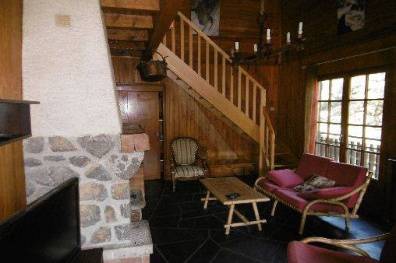 Location de vacances - Chalet à Alex - Séjour cheminée et coin détente