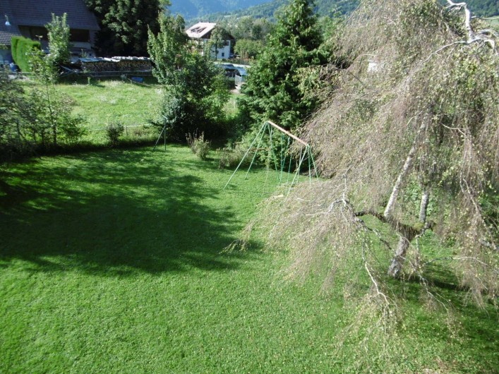 Location de vacances - Chalet à Alex - le jardin avec les balançoires